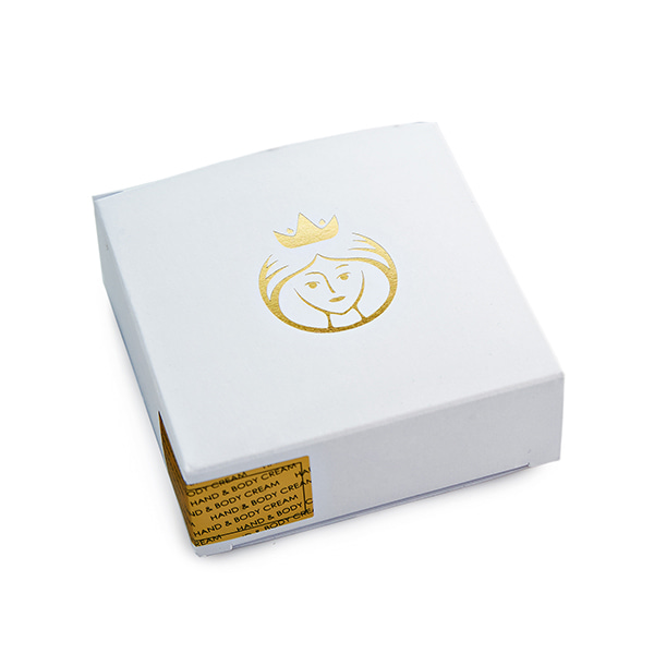 white box with the golden goddess engraving
