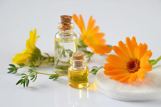 two ampules of oil and orange flowers